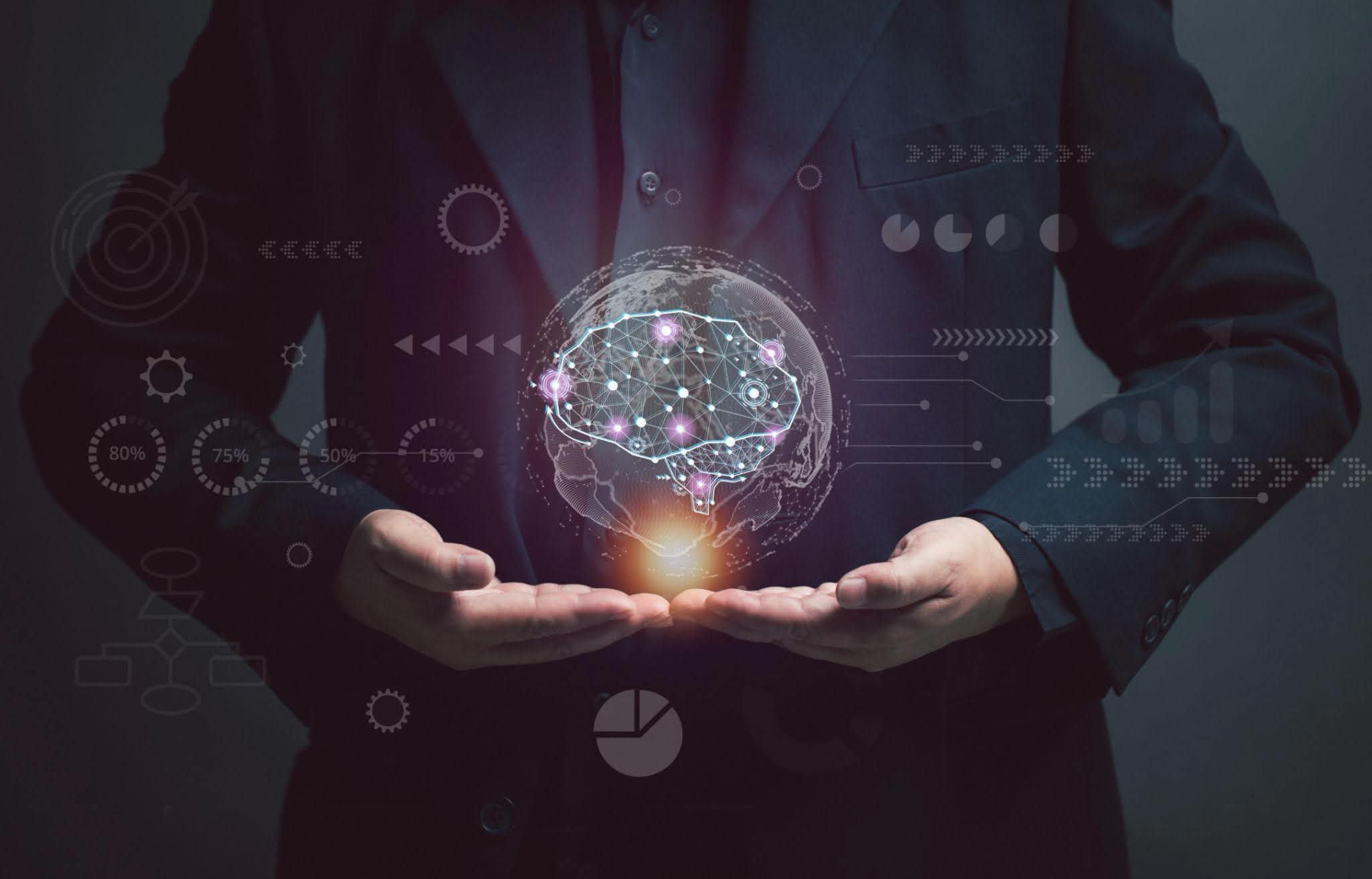 Programme leader holding an AI-driven candidate intelligence interface, representing forward-thinking executive education leadership