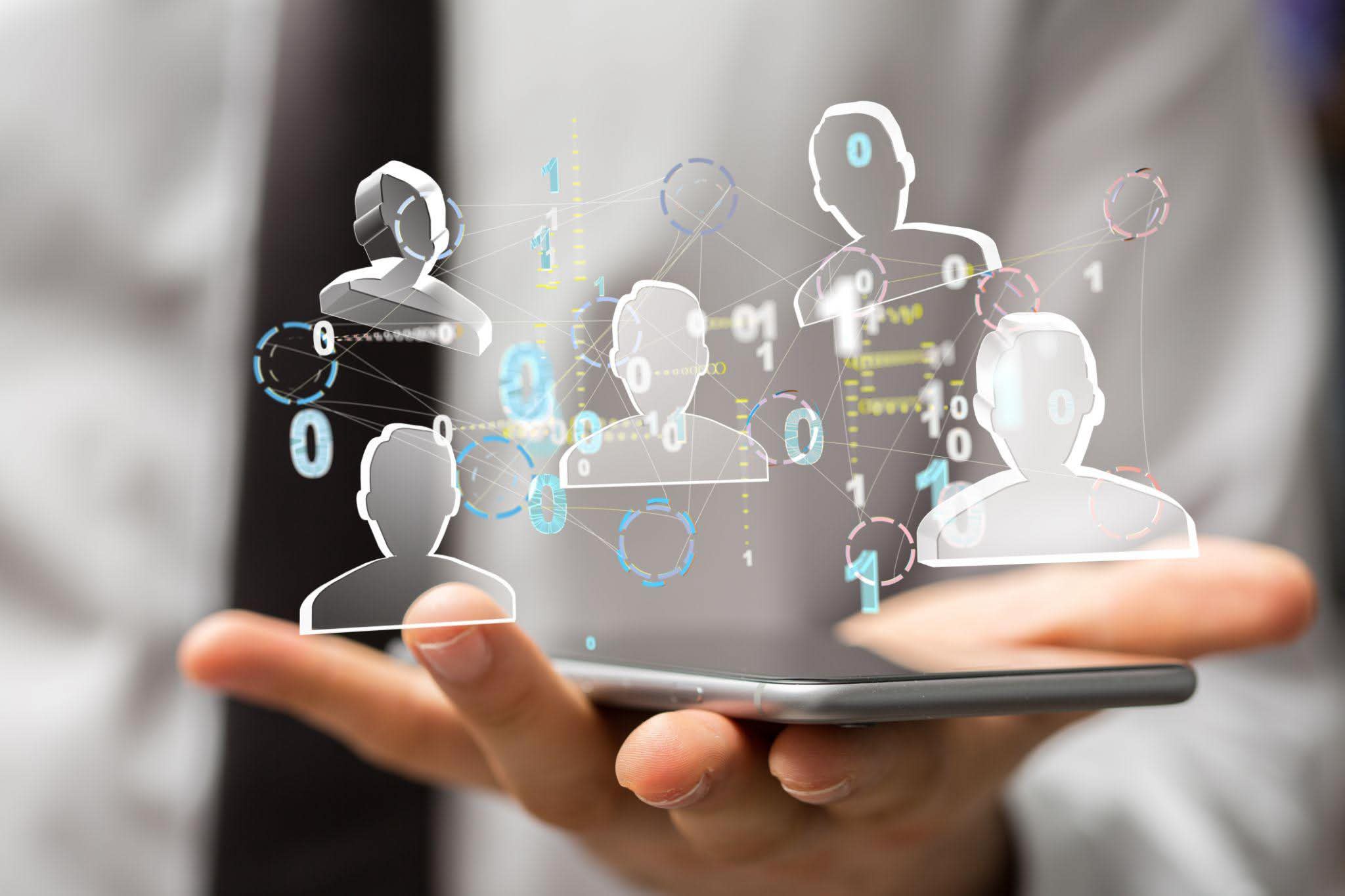 Hand holding a smartphone with a network of executive profile cards floating above, representing AI-driven candidate matching